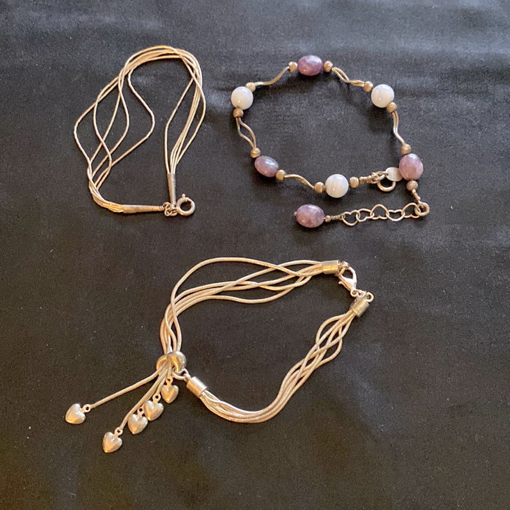 Three Silver Bracelets